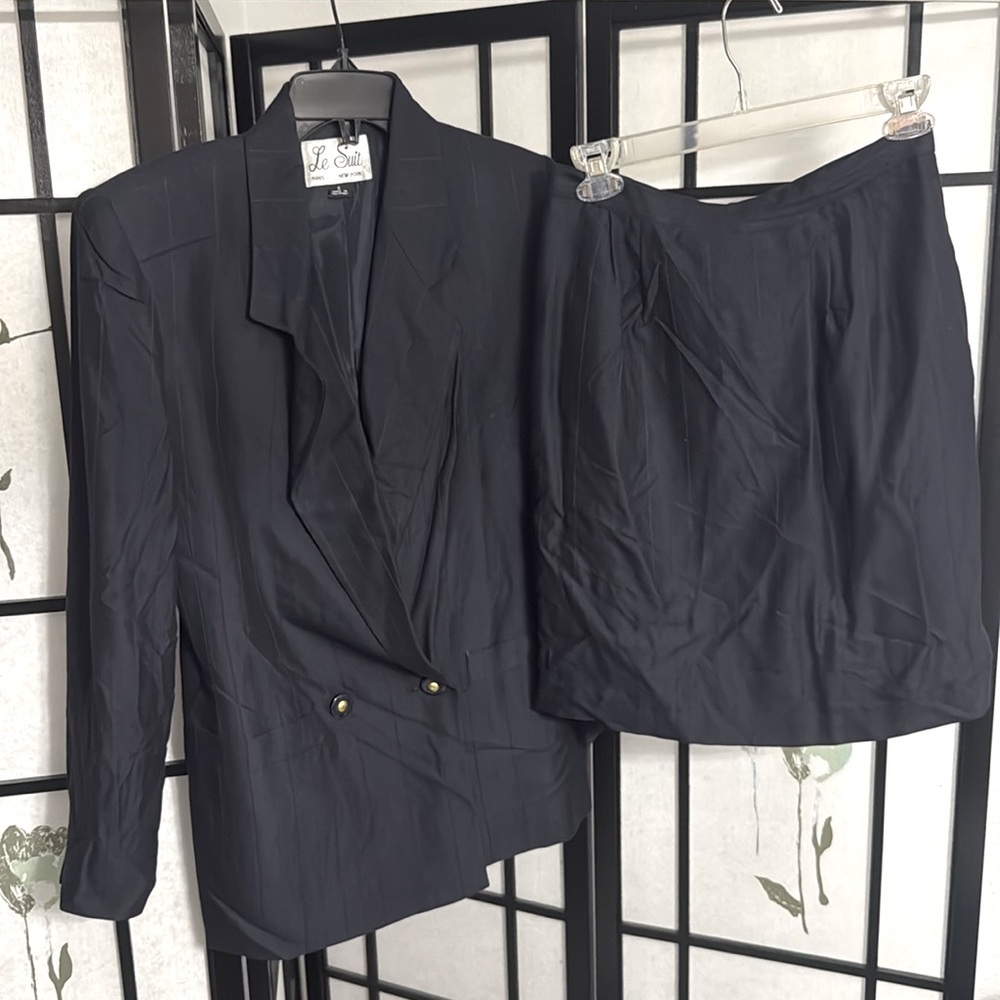 Double breasted pinstripe lined skirt suit